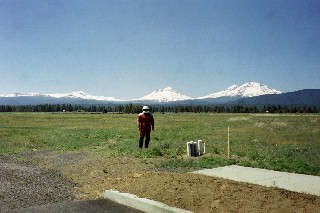 The Sisters (note the beginnings of a subdivision in the foreground)